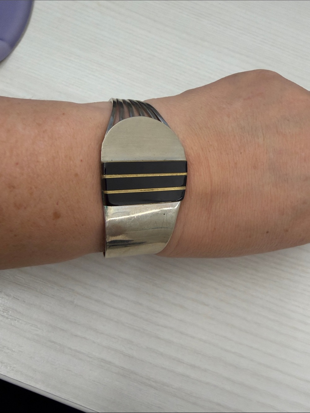 Silver and Black Cuff Wristband with Gold Accent Stripes
